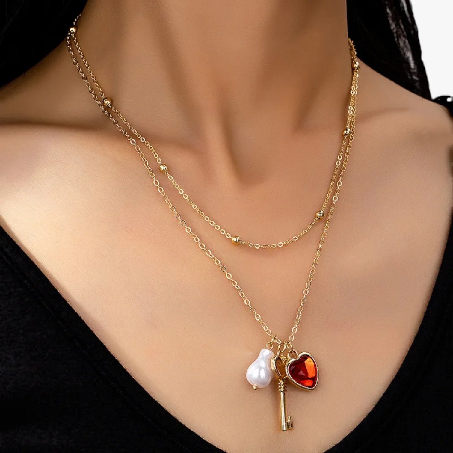Elsie | Collana cuore con perla elegante - 1 - elegant womens necklaces necklace NECKLACES Necklaces for Women - Concept Palermo